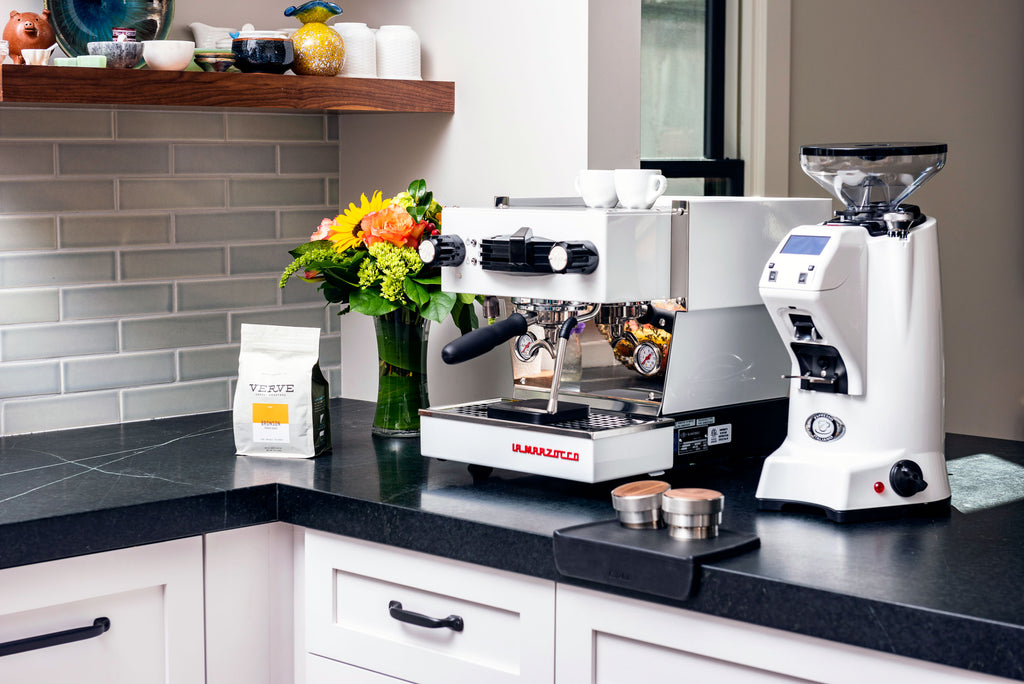 The La Marzocco Linea Mini espresso machine alongside a Eureka Zenith espresso grinder